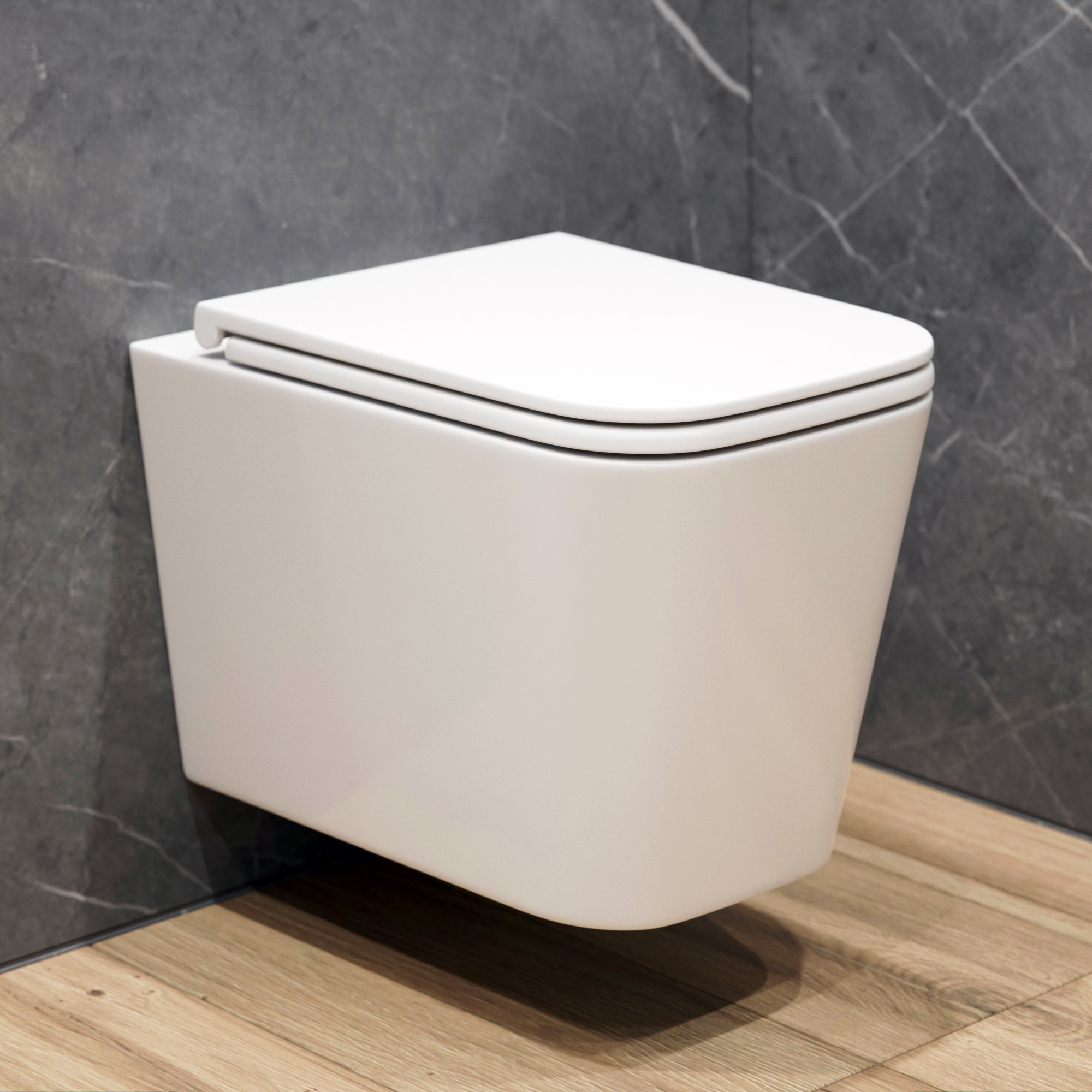 Унитаз подвесной K404 безободковый, сиденье тонкое ДП, крепления